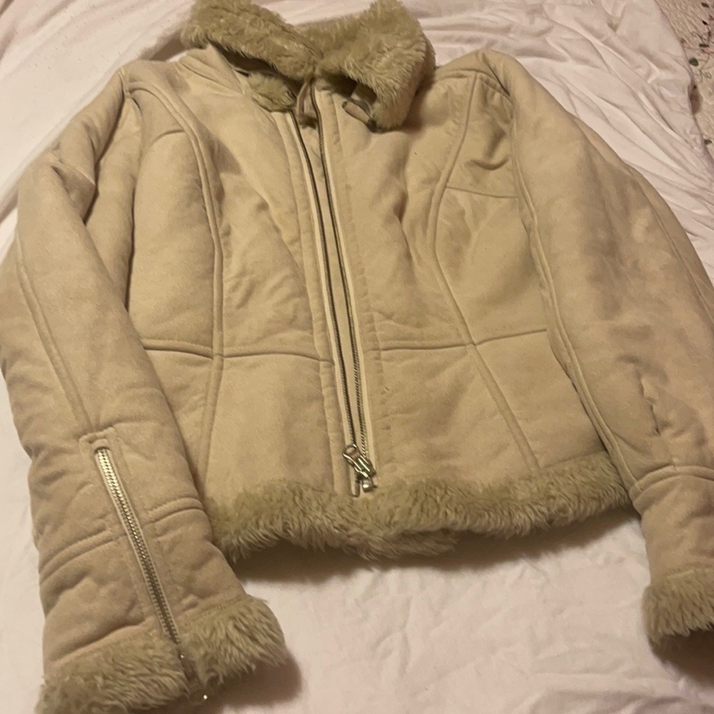 Beige jacket with fur lined zipper front